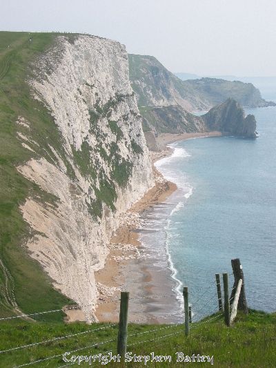 A path weaves its way across the white cliffs in Dorset