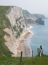 A path weaves its way across the white cliffs in Dorset