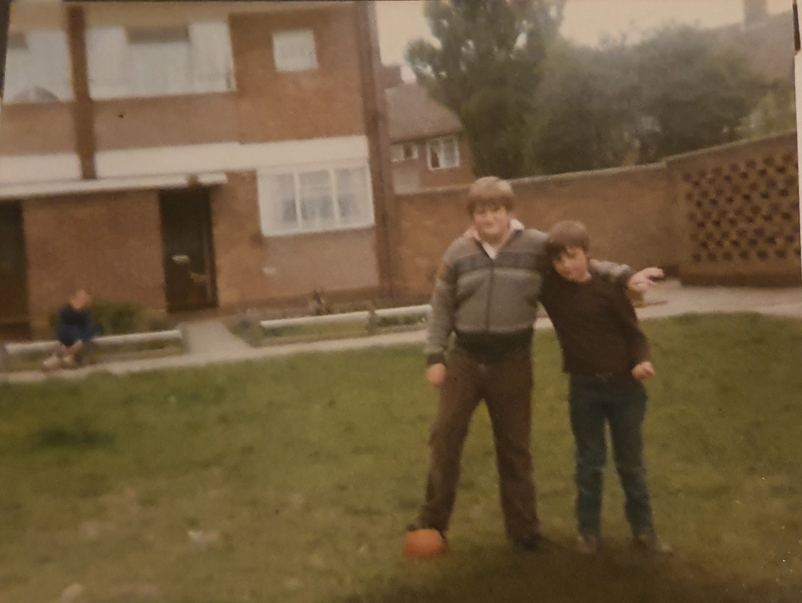 Block of maisonettes with grassy area at the front